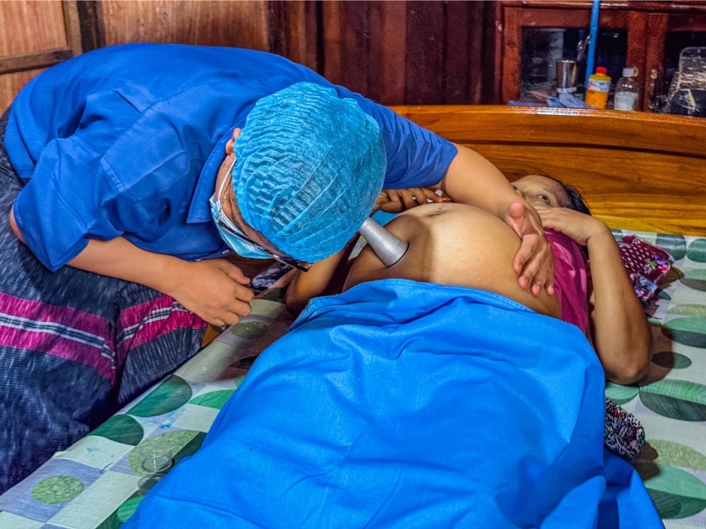 Figure 4: Pregnant woman is receiving antenatal care at UNFPA partner's mobile clinics in flood-affected areas. Photo © UNFPA Myanmar