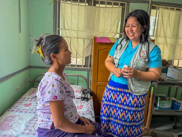 A local midwife provides antenatal care to a pregnant woman at a static clinic in an earthquake-affected area of Mandalay. Photo © UNFPA Myanmar
