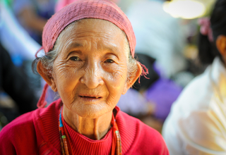 An elderly woman visiting a UNFPA-supported Women and Girls Centre in Myitkyina, Kachin State. 