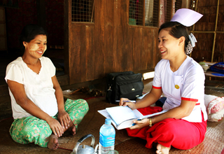 Midwife Phyu Phyu Win walks from village to village. “I frequently visit 10 villages so that pregnant women who work all day long can receive regular check-ups and antenatal care without travelling to the clinic. © UNFPA/Nowai Linn 