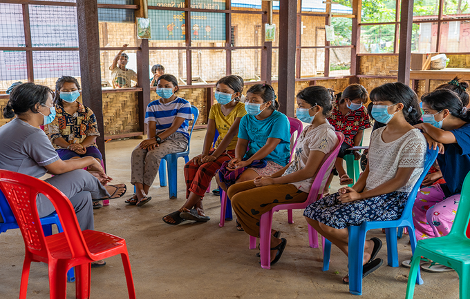 Adolescent girls at IDP camp participate in sexual and reproductive health awareness session in Kachin State.  Photo: UNFPA MMR