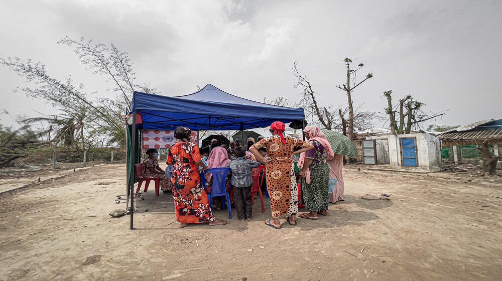 Women from the village of Say Thamar Kyi receive health care and reproductive health services at a mobile clinic operating in ar